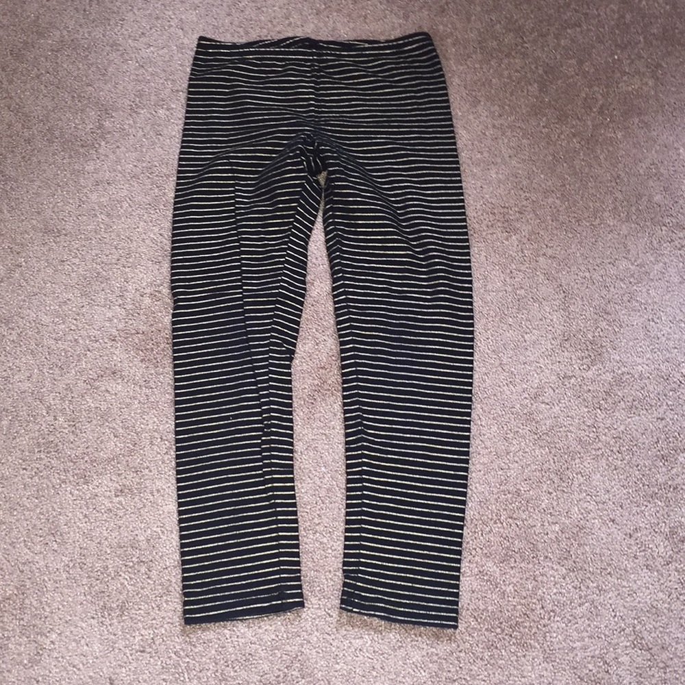 “Old Navy” black pants with gold stripes.